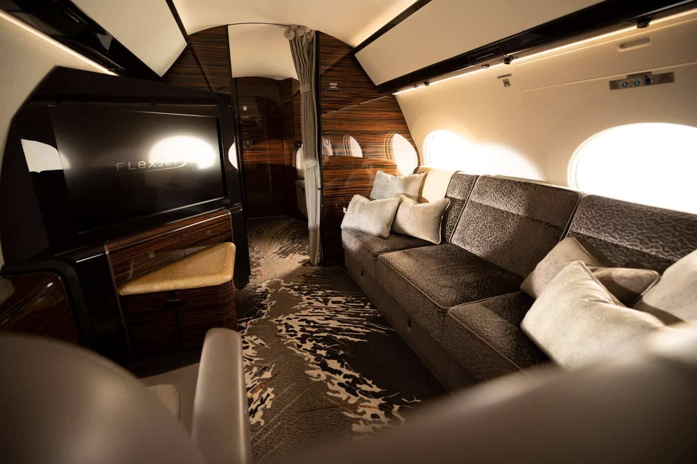 LXi Cabin Collection, Gulfstream G650, Ultra Long Range, Cosmos Interior, Flexjet, leather seating, jet interior, private jet, entertainment zone, cabin interior, cabin view, television